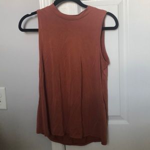 Burnt red tank top with open hole in back